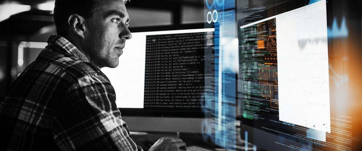 A CSFI cyber threat intelligence analyst monitoring systems